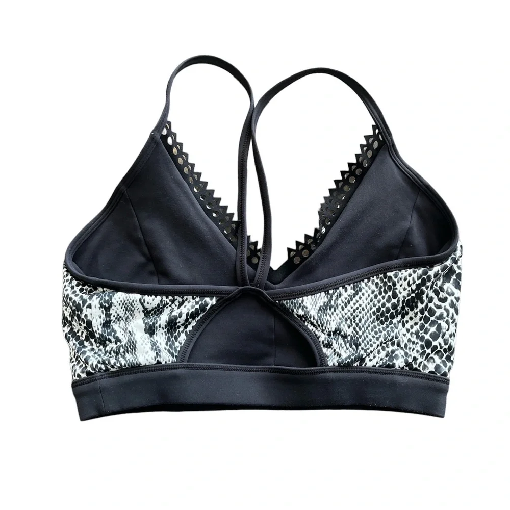 Track & Bliss reversible sports bra black‎ and snake pattern